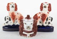 Three Porcelain Figures of Spaniels