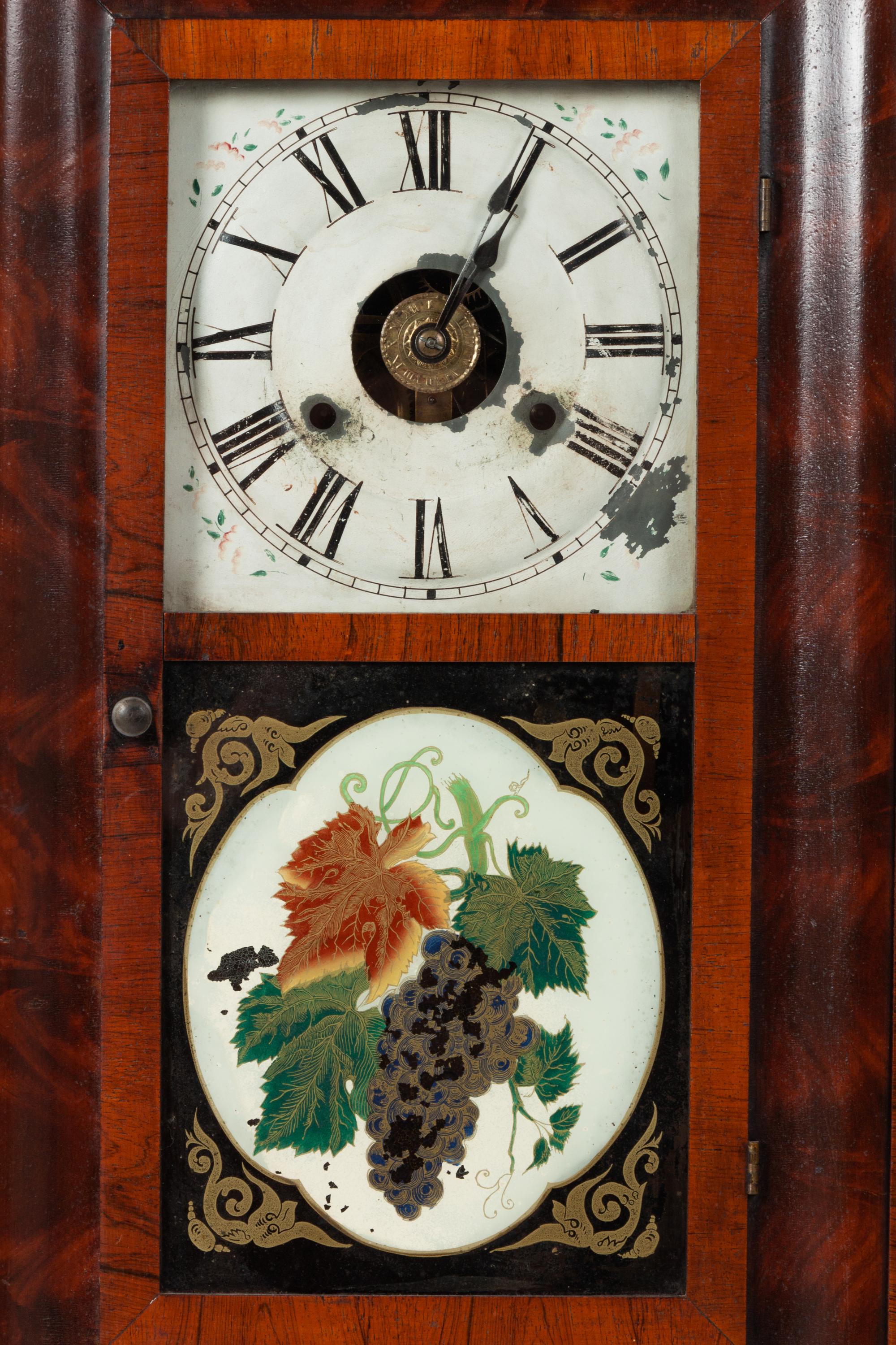 A Classical Mahogany Veneered Eglomise and Reverse-Painted Glass Inset Shelf Clock