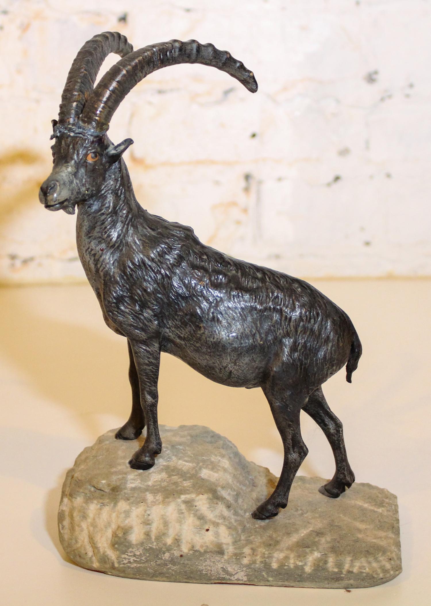 A Continental Cast Metal Figure of a Mountain Goat. Height overall 10 1/4 inches.