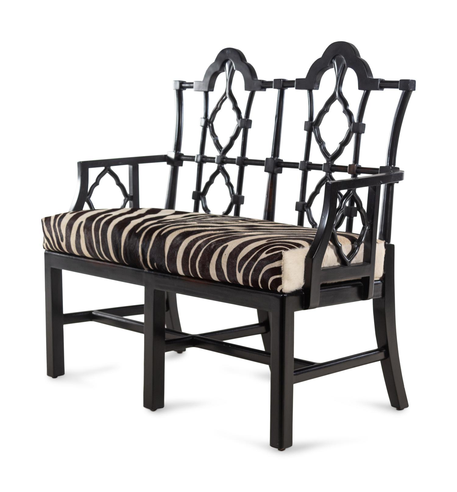 An Ebonized Chinese Chippendale Style Bench with Faux Zebra Cow Hide Upholstery