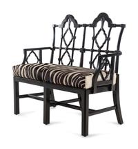An Ebonized Chinese Chippendale Style Bench with Faux Zebra Cow Hide Upholstery