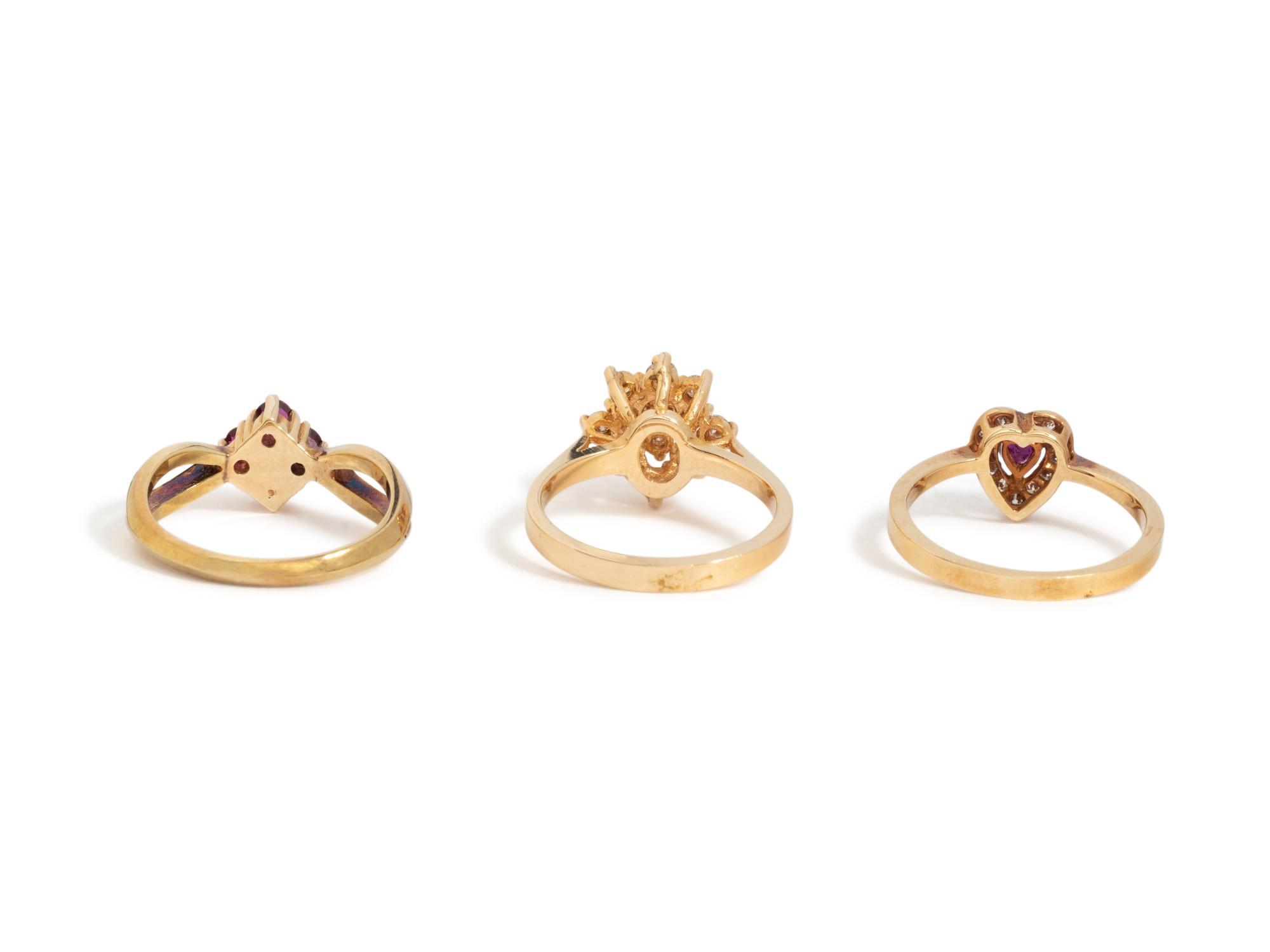 COLLECTION OF YELLOW GOLD, DIAMOND AND RUBY RINGS