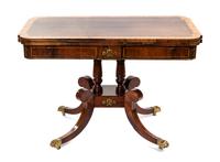 A Regency Brass Inlaid Rosewood and Satinwood Sofa Table Height 28 1/2 x width 42 x depth 23 1/4 inches. — CIRCA 1820