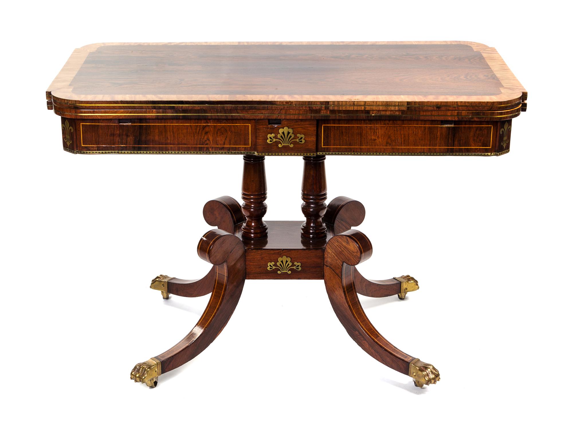 A Regency Brass Inlaid Rosewood and Satinwood Sofa Table Height 28 1/2 x width 42 x depth 23 1/4 inches. — CIRCA 1820