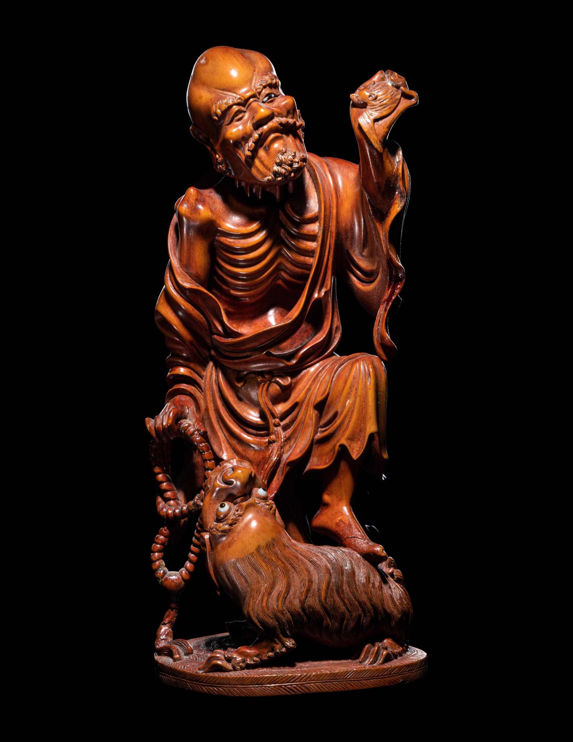 A Chinese Carved Boxwood Figure of Luohan