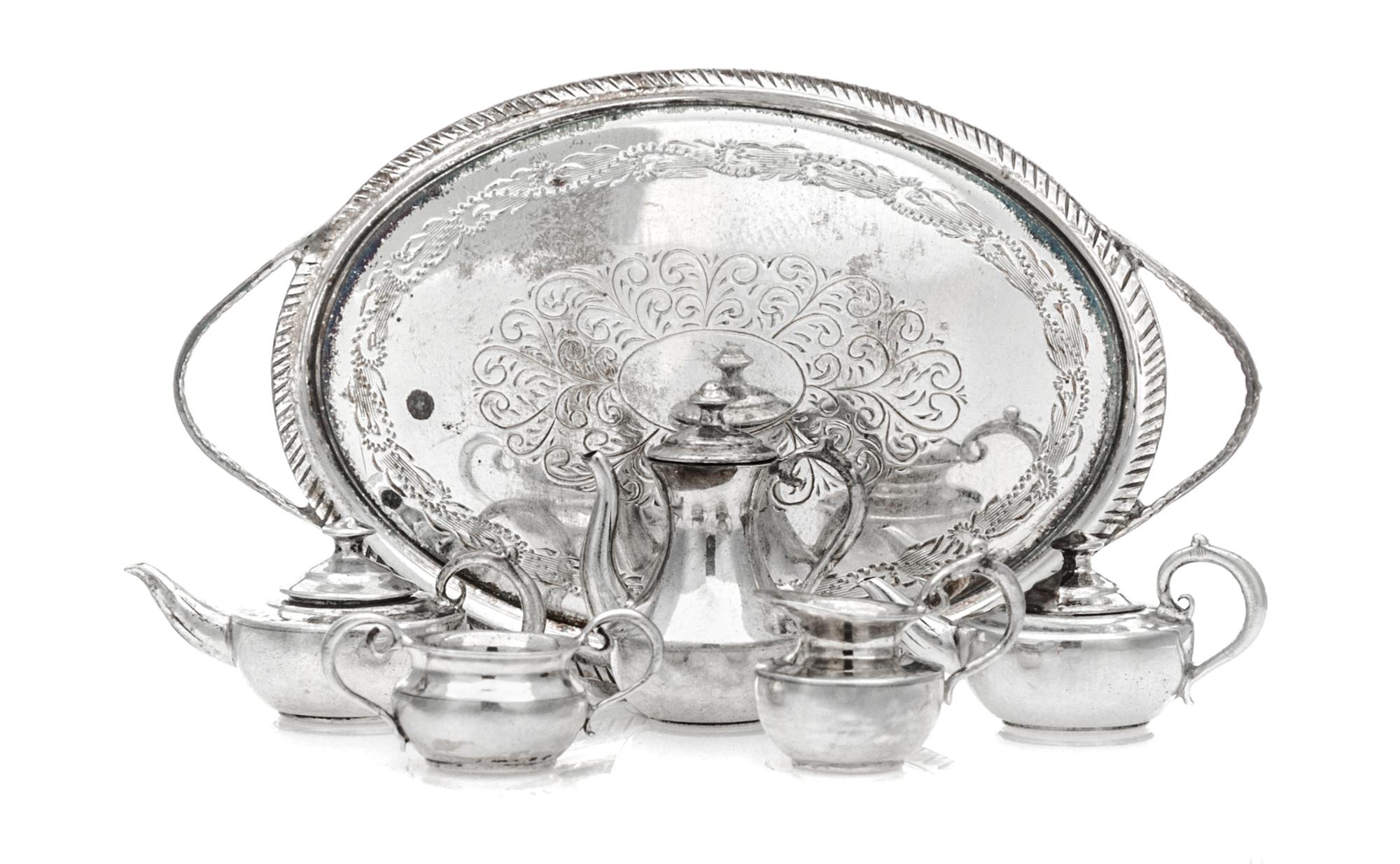 An English Silver Six-Piece Tea and Coffee Service, William Gordon Blacklock, London, comprising two teapots, a coffee pot, a creamer,