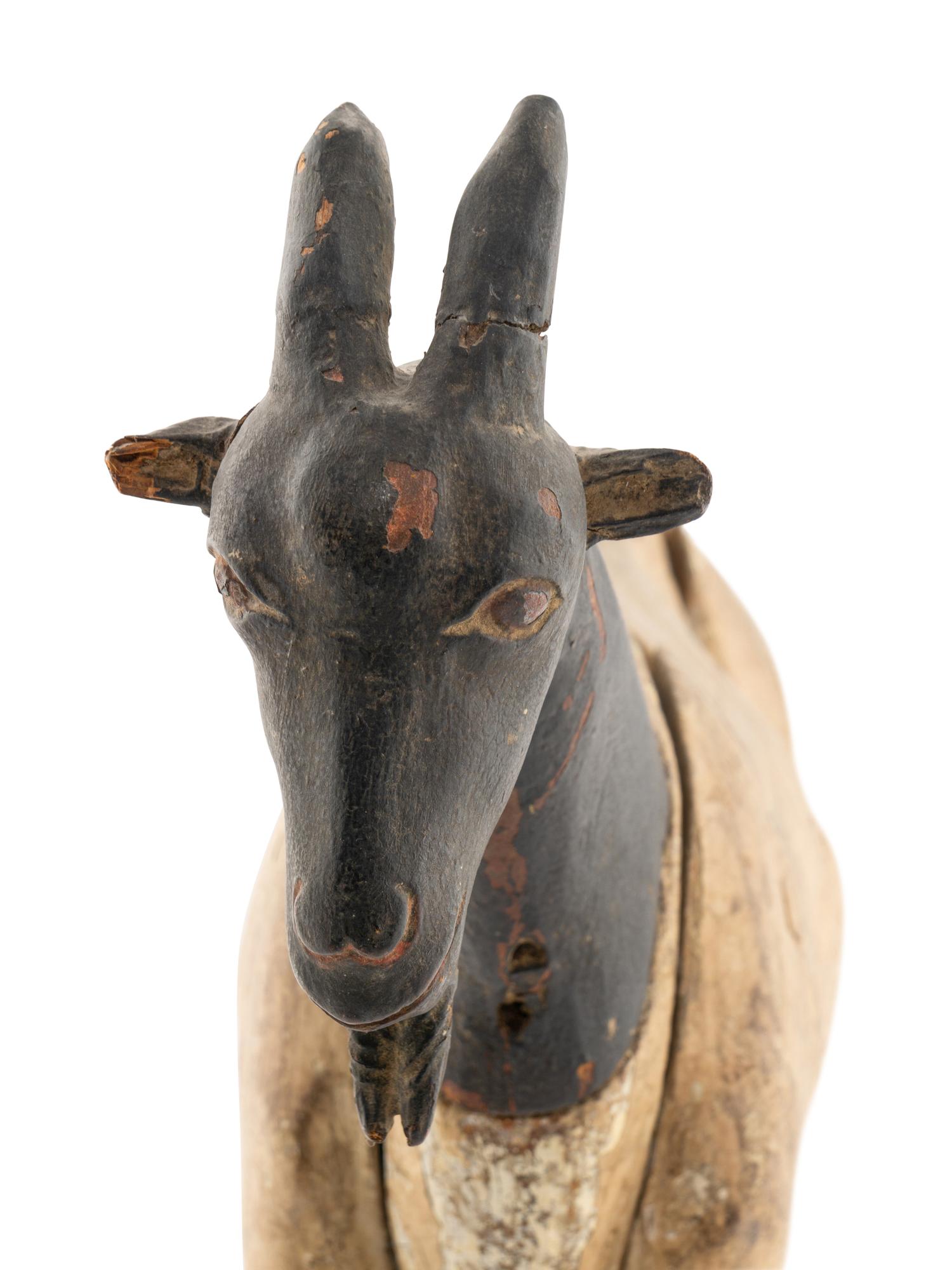 A Carved and Painted Wood Billy Goat Figure