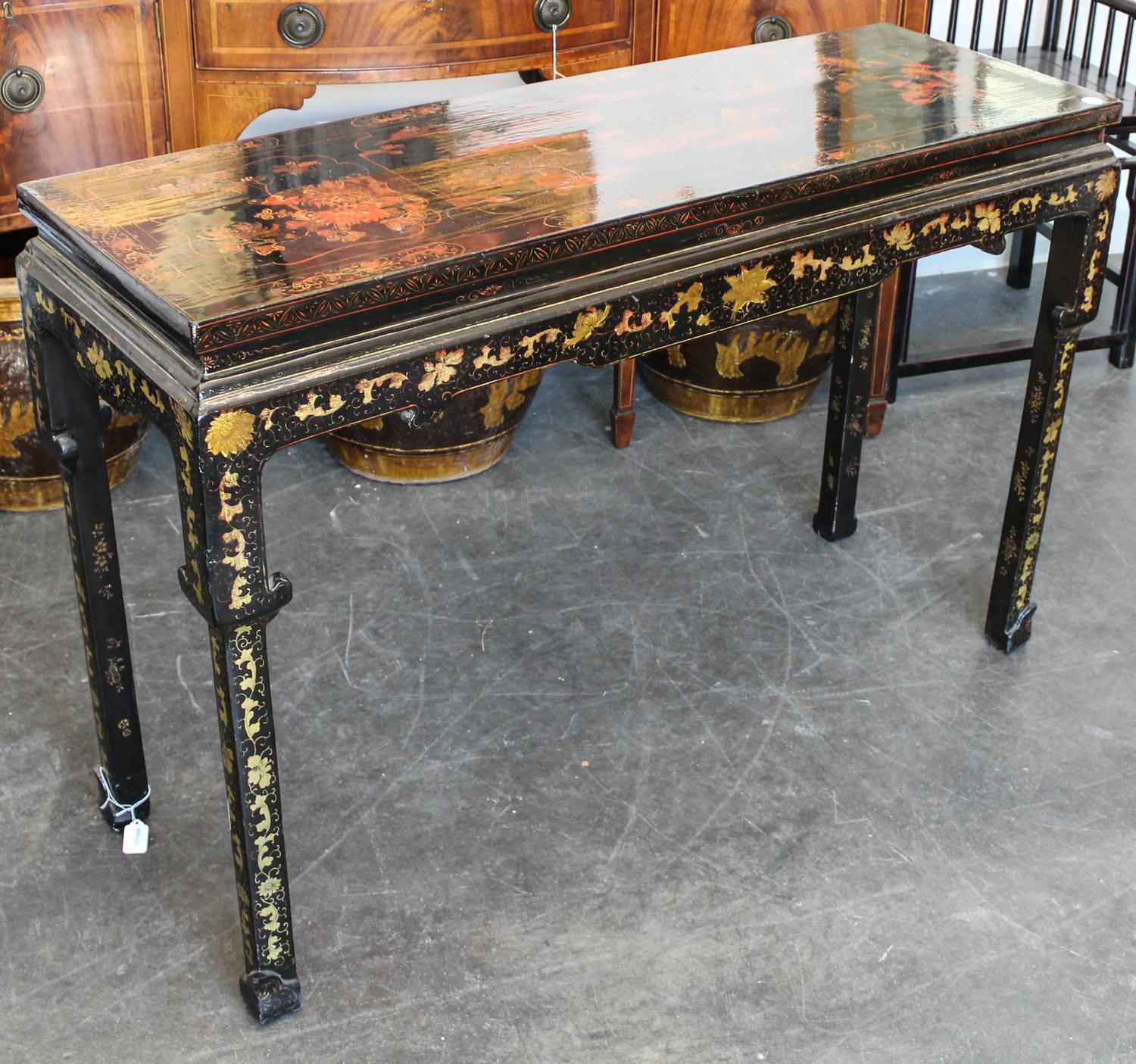 A Chinese Lacquered Altar Table Height 32 1/4 x width 49 x depth 16 1/2 inches.