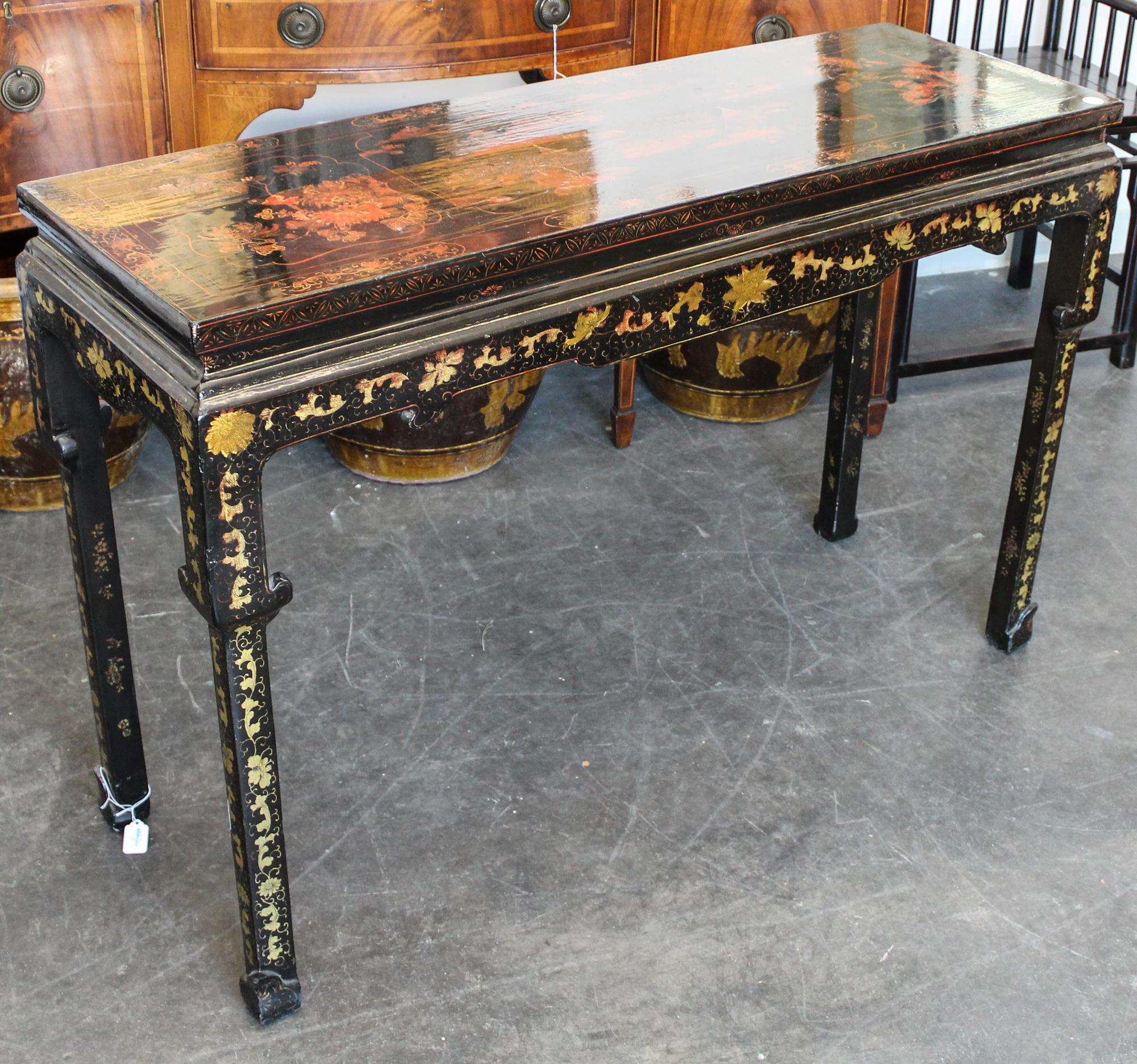 A Chinese Lacquered Altar Table Height 32 1/4 x width 49 x depth 16 1/2 inches.