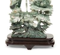 A Pair of Chinese Carved Jadeite Figures of Phoenixes