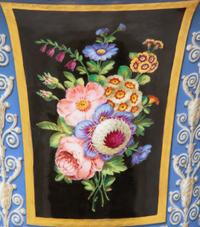 A Pair of Continental Parcel-Gilt and Polychrome Painted Porcelain Urns
