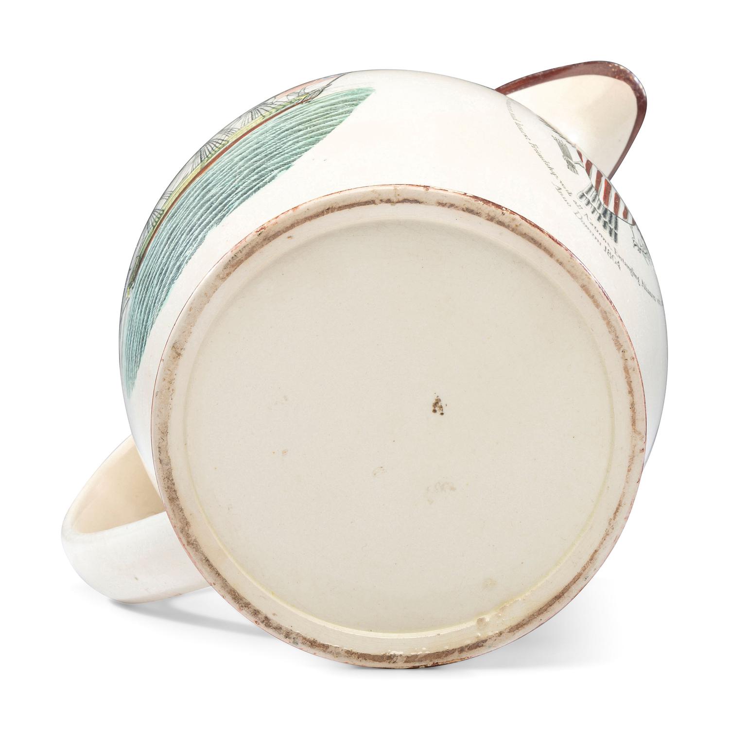A Liverpool Transfer-Printed Creamware 'Memory of George Washington and the Proscribed Patriots of America' Pitcher with Polychrome Embellishment