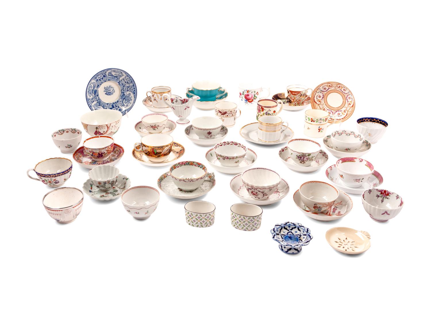 A Large Collection of English Porcelain Teacups and Saucers