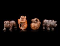 Four Japanese Carved Wood 'Animal' Netsuke