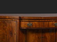 A Federal Fan-Inlaid and Figured Mahogany Serpentine Sideboard