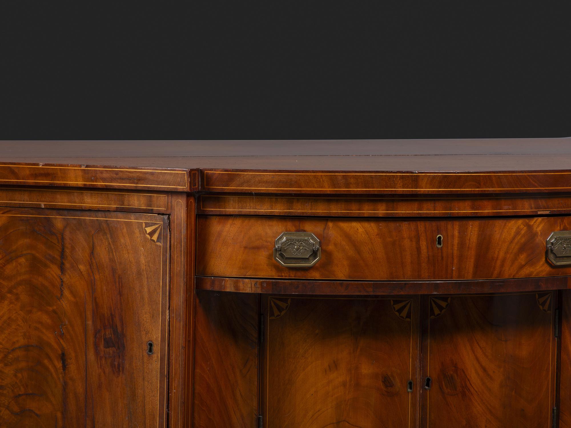 A Federal Fan-Inlaid and Figured Mahogany Serpentine Sideboard