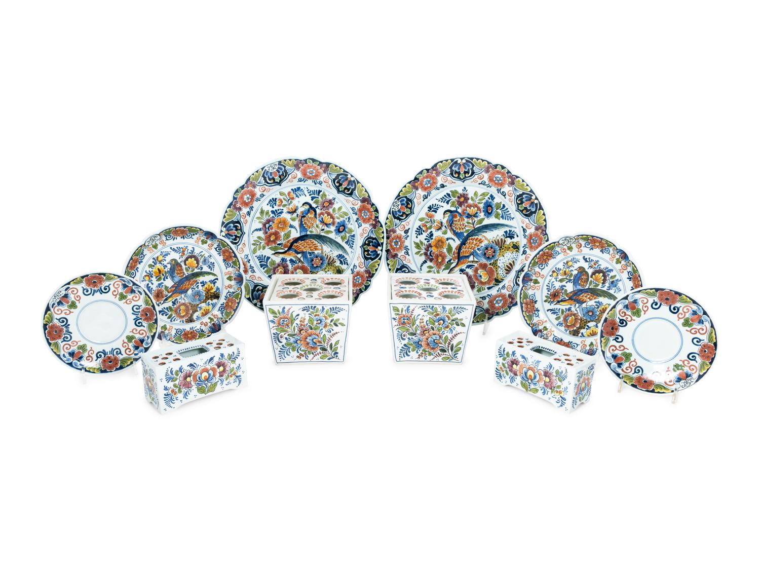 A Delft Polychrome Decorated Earthenware Dinner Service