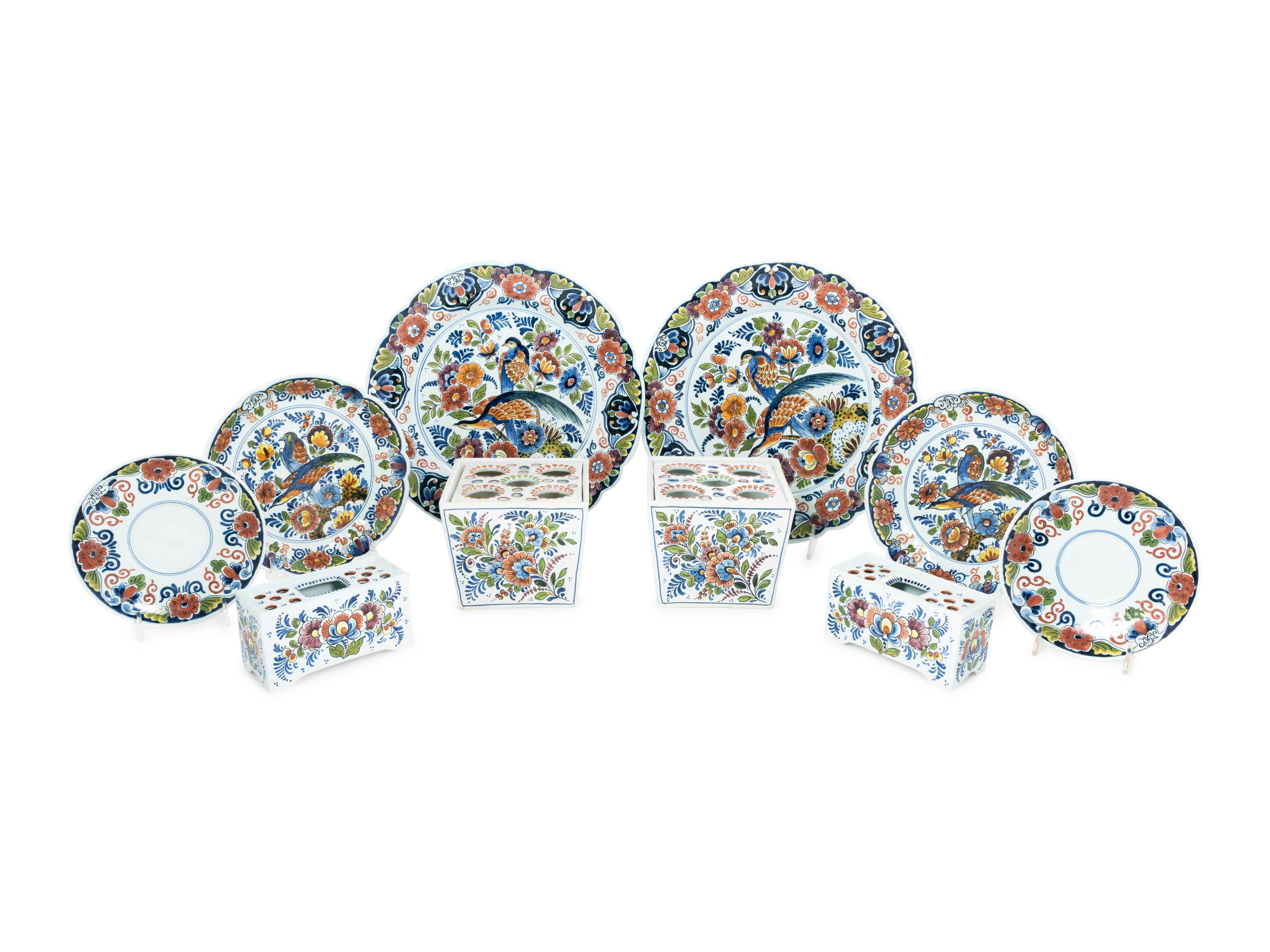 A Delft Polychrome Decorated Earthenware Dinner Service