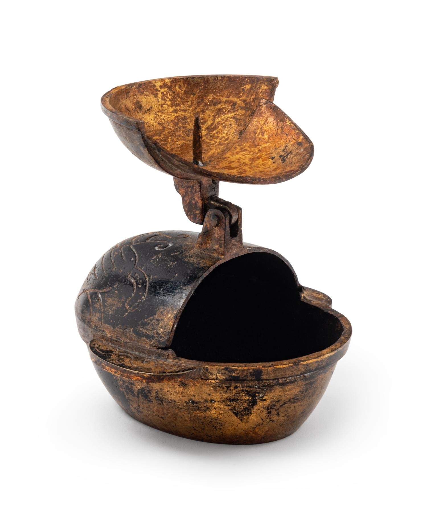 A Japanese Gilt Bronze Candle Holder