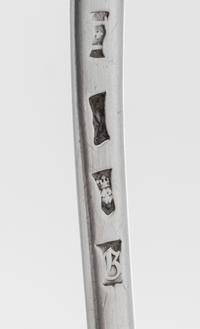 A George III Silver Ladle, Possibly John Innocent, London, 1762, having a shell form bowl, the handle with a volute terminal.