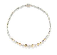 A Platinum, Diamond and Colored Diamond Rivière Necklace, 27.90 dwts.