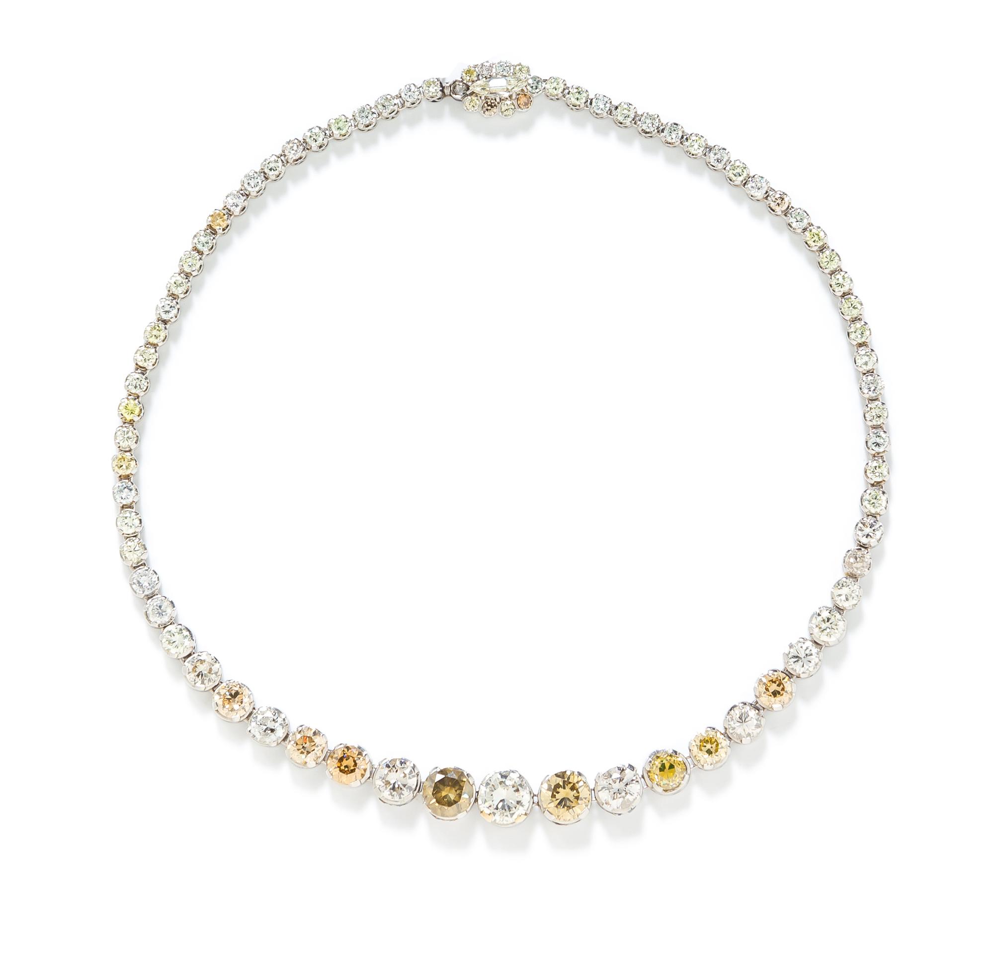 A Platinum, Diamond and Colored Diamond Rivière Necklace, 27.90 dwts.