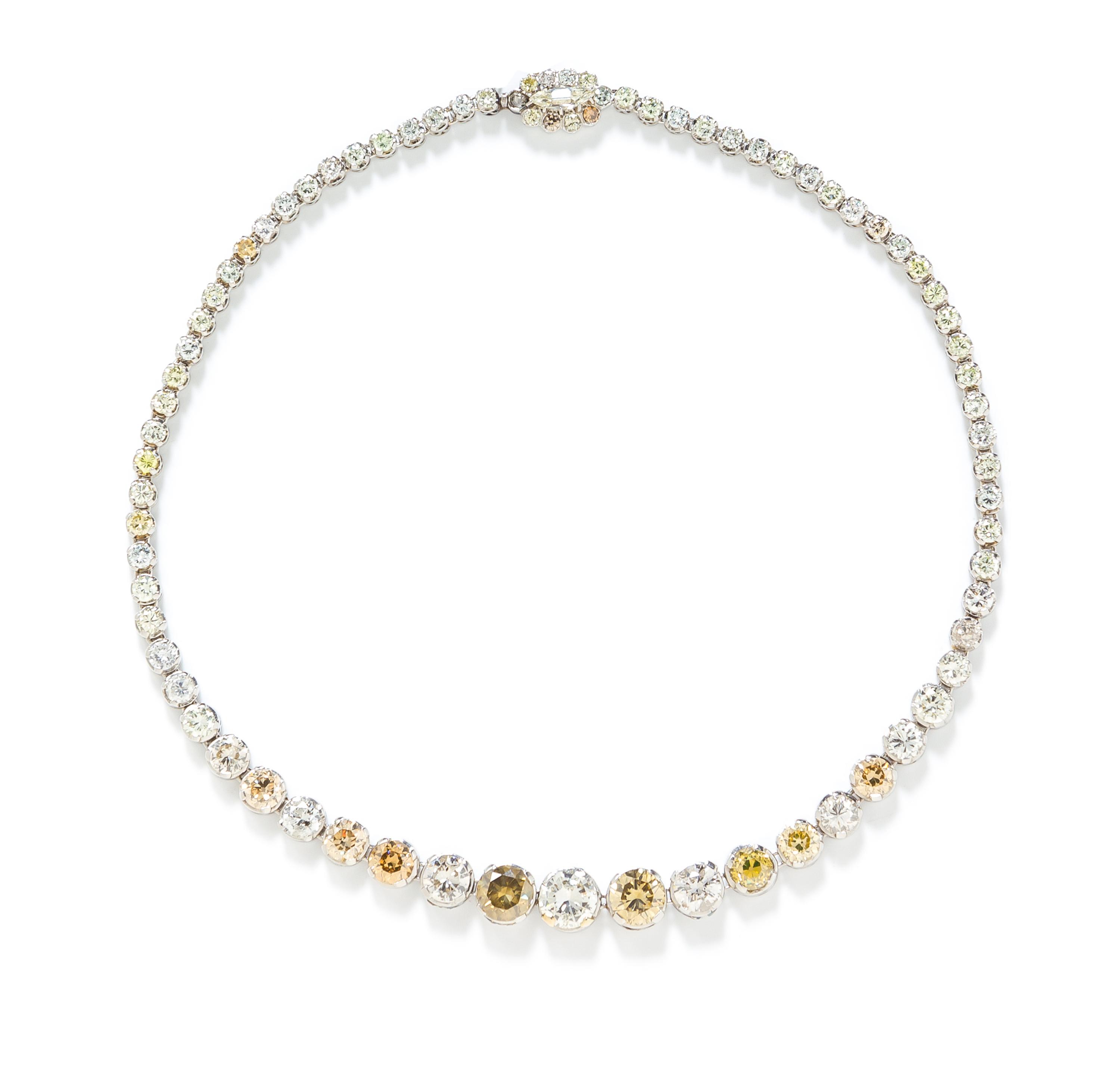 A Platinum, Diamond and Colored Diamond Rivière Necklace, 27.90 dwts.