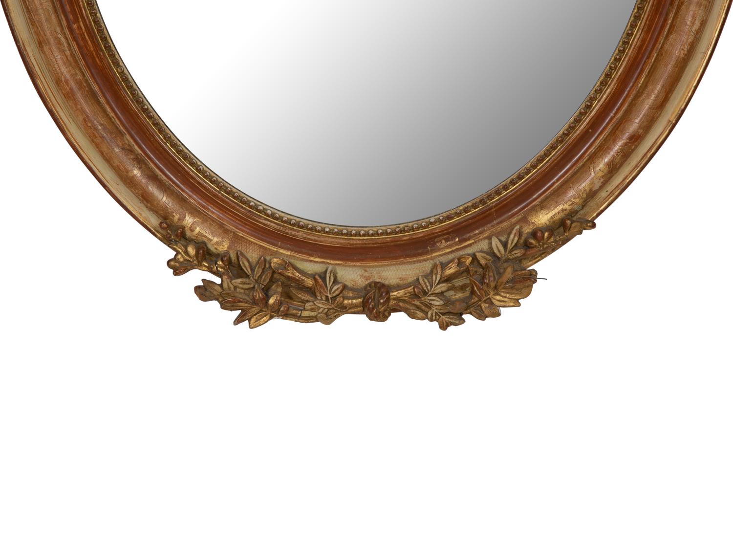 A Napoleon III Giltwood Oval Mirror