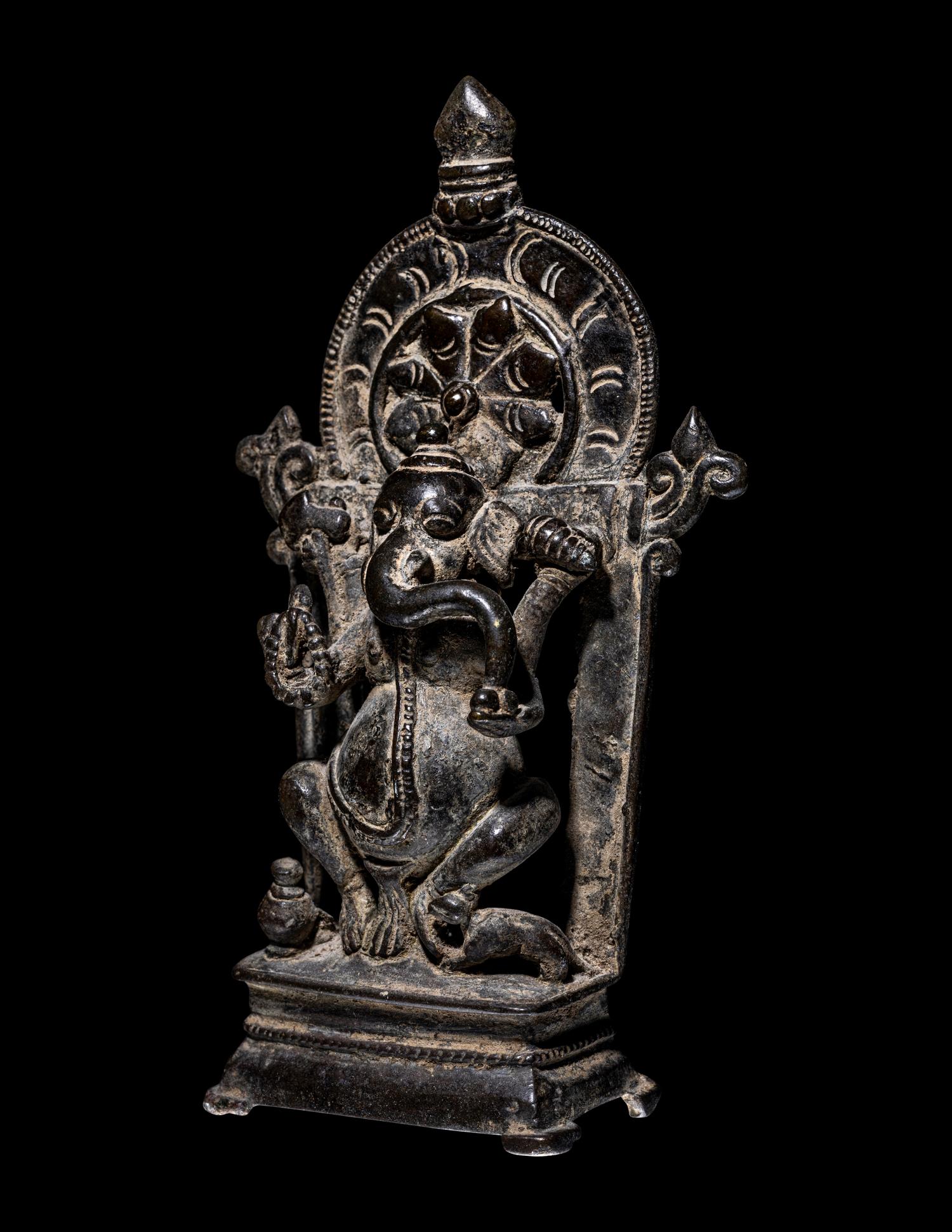 An Indian Bronze Ganesha, Enthroned