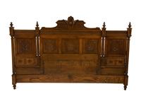 A Renaissance Revival Carved Oak Headboard
