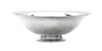 A Danish Silver Bowl, Georg Jensen Silversmithy, Copenhagen, 1933-1944, having a spot hammered finish and raised on a stepped foot.