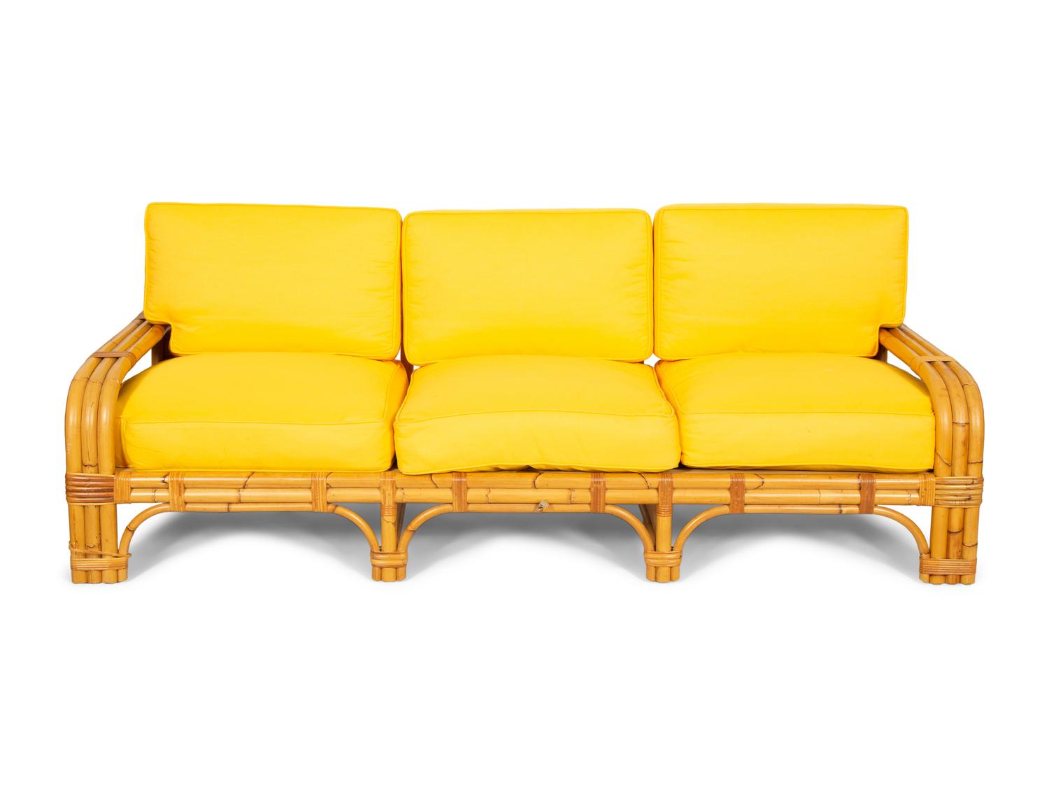 A Bielecky Brothers Rattan Settee with Two End Tables and a Pair of Ottomans