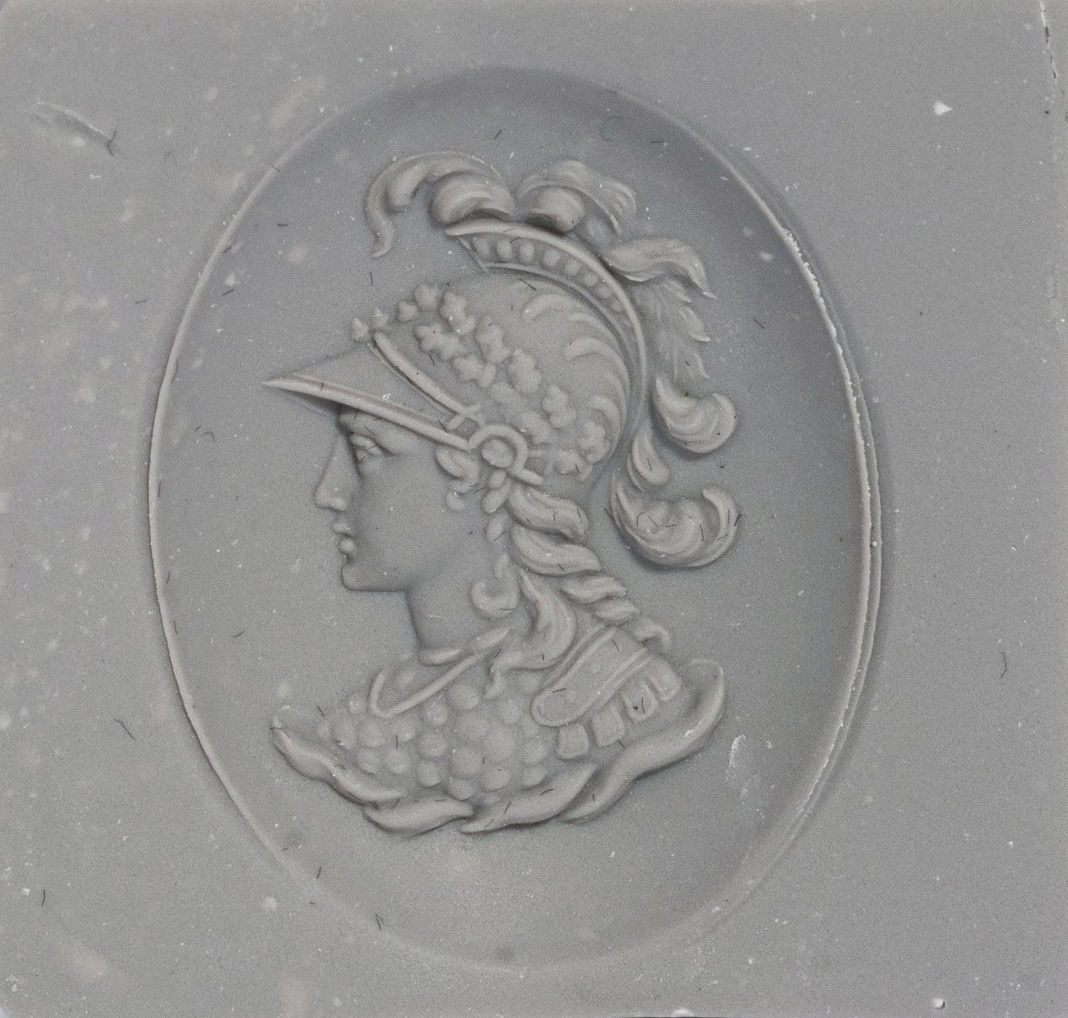 A Neoclassical Gold and Onyx Pendant with a Bust of Athena