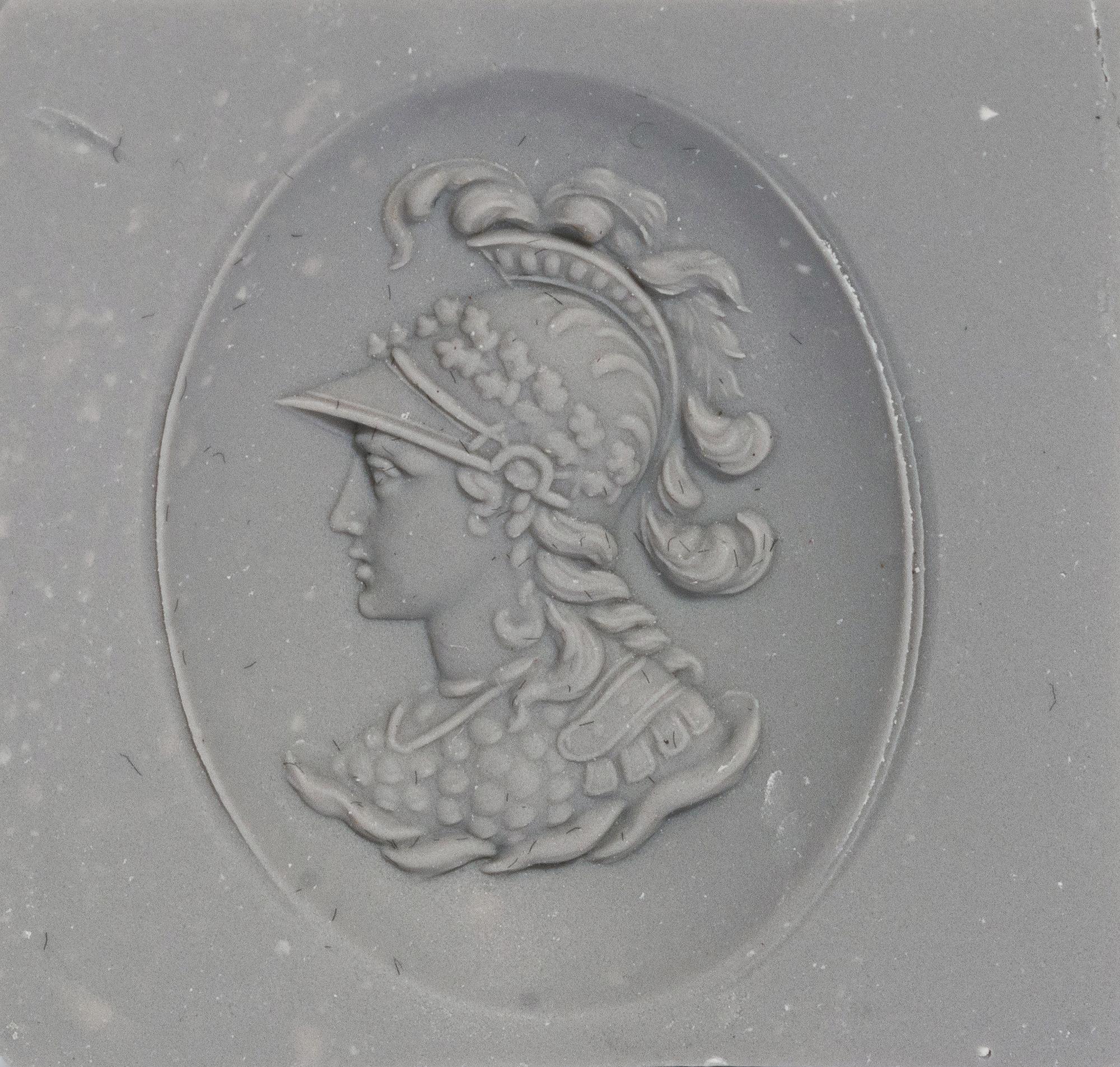 A Neoclassical Gold and Onyx Pendant with a Bust of Athena