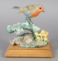 A Royal Worcester Dorothy Doughty Bird, Robin in the Autumn Woods. Height 7 inches.