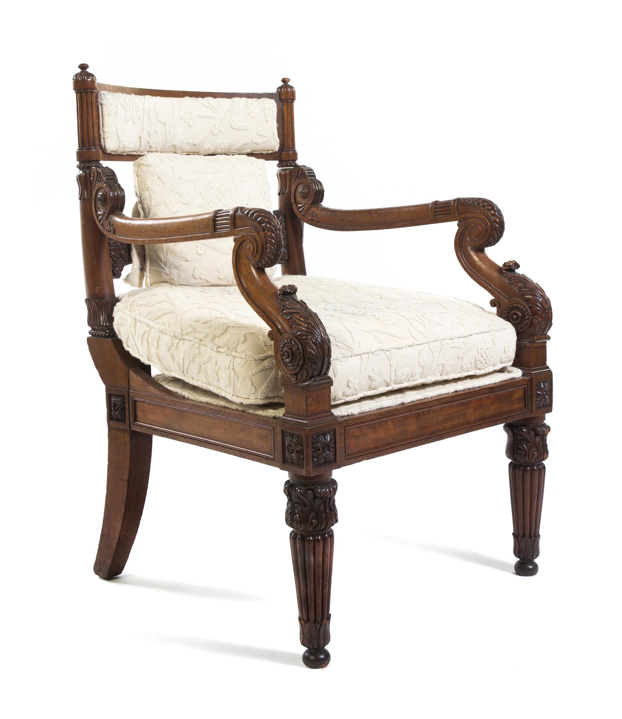 A Set of Twelve Regency Mahogany Dining Chairs, Height 37 inches.