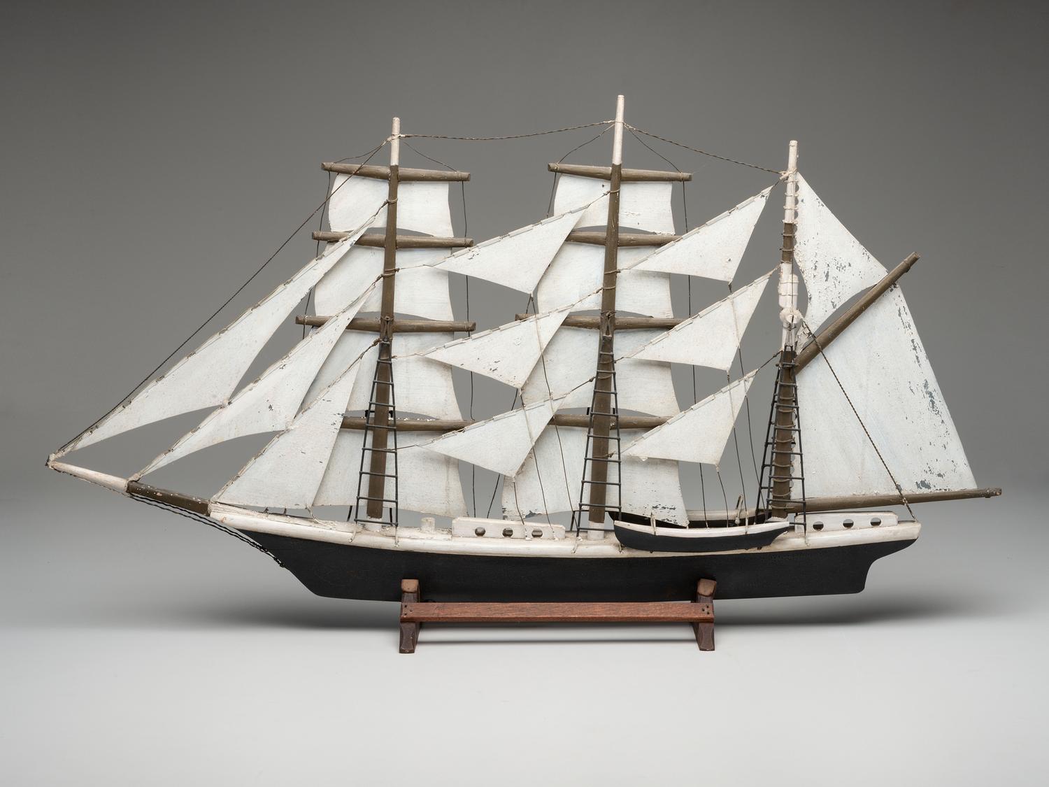 A Carved and Painted Wood Model of a Ship