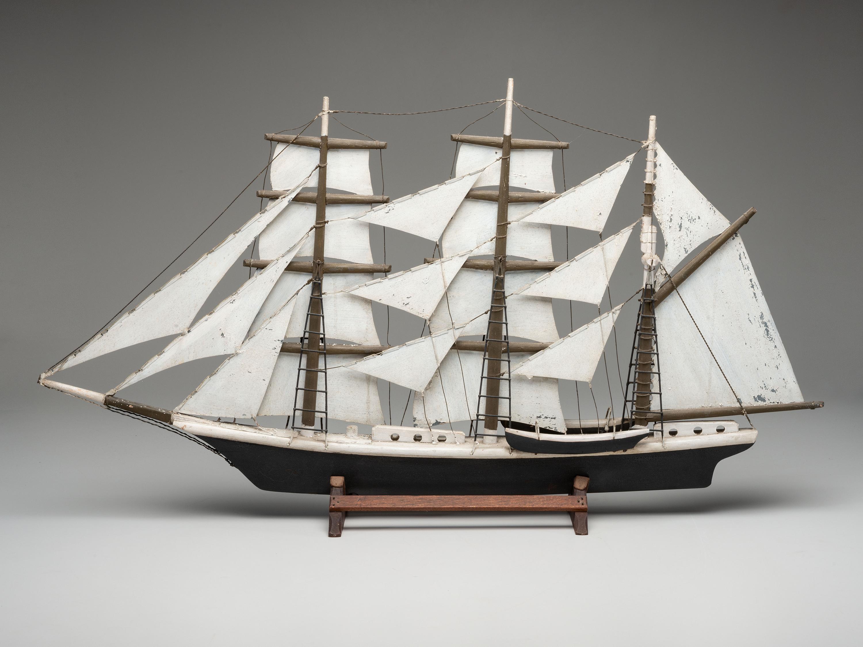 A Carved and Painted Wood Model of a Ship