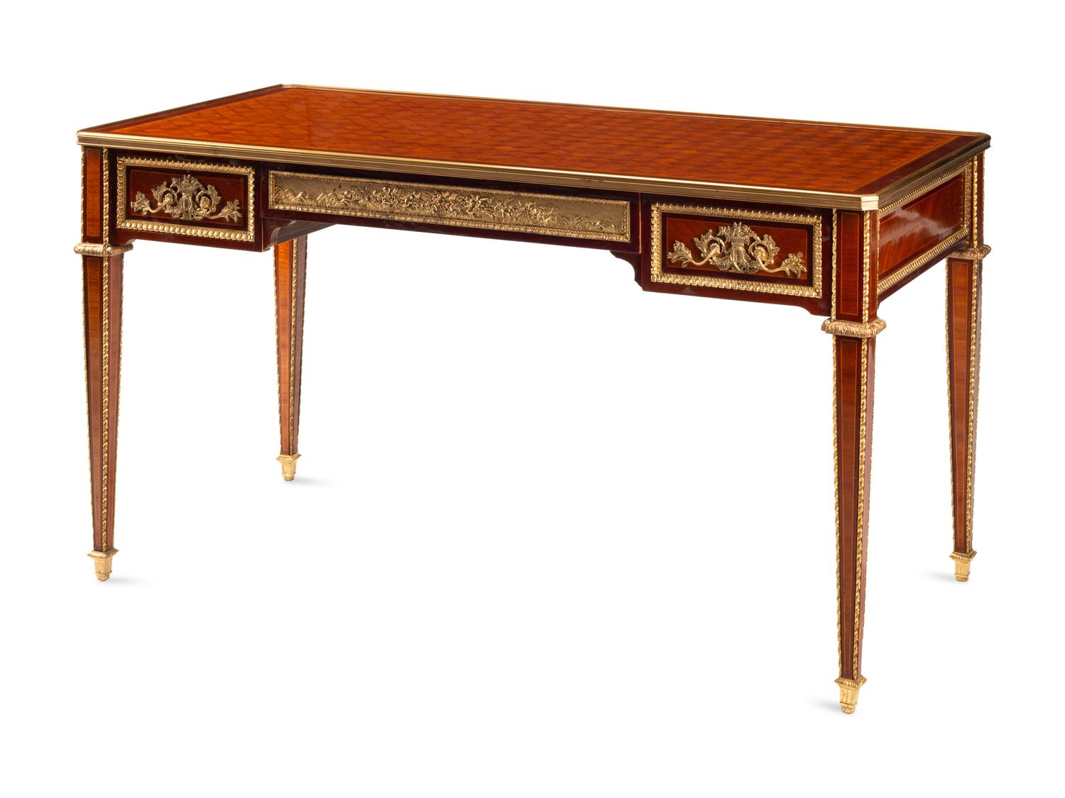 A Louis XVI Style Gilt Bronze Mounted Parquetry Bureau Plat