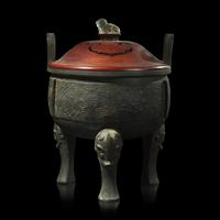 A large Chinese patinated bronze archaistic tripod censer, Ding, and wood cover, The Bronze 17th/18th Century or Earlier 清 青銅鼎式爐