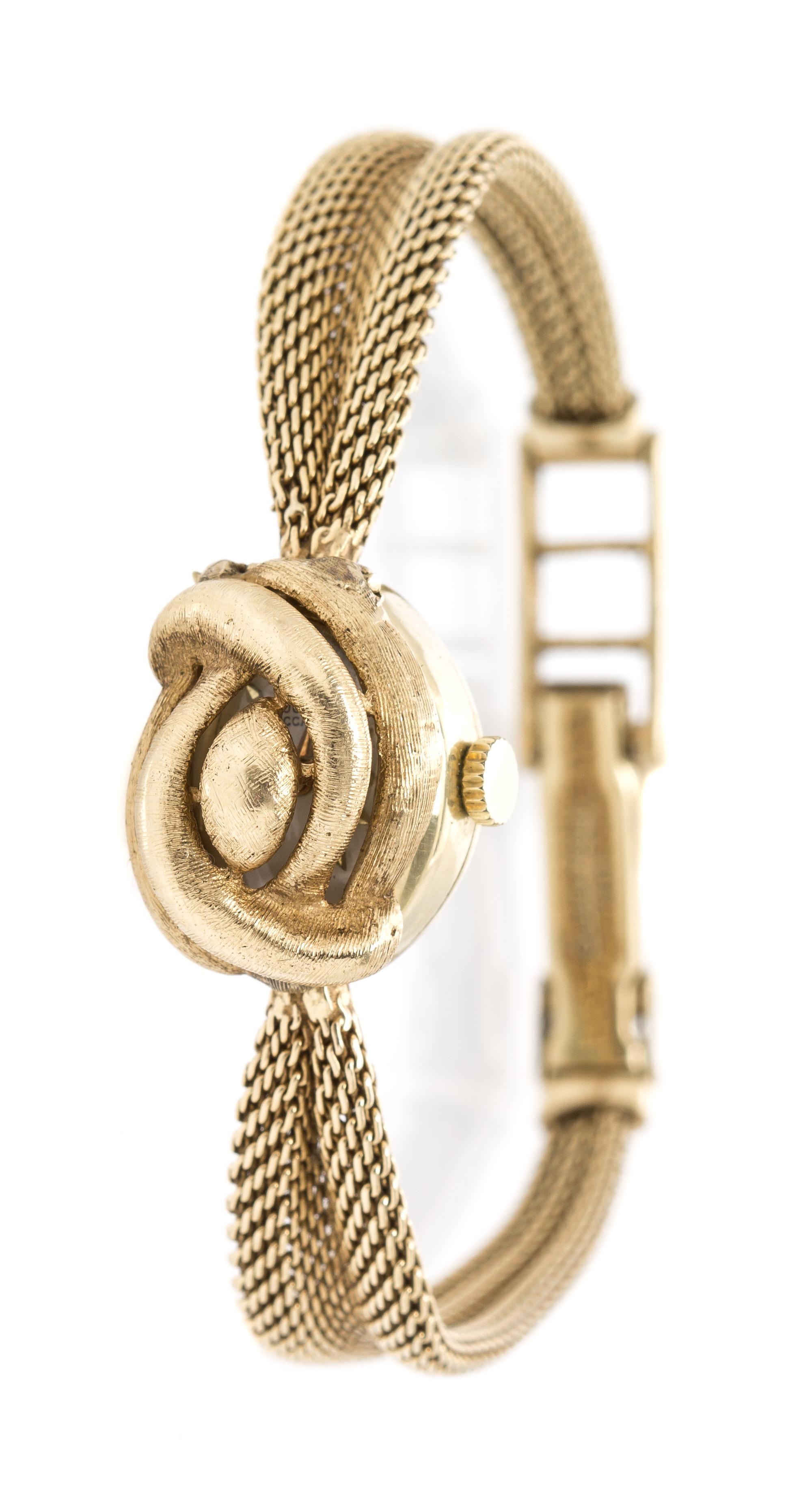 A 14 Karat Yellow Gold Surprise Wristwatch, Lucien Piccard, 14.10 dwts.