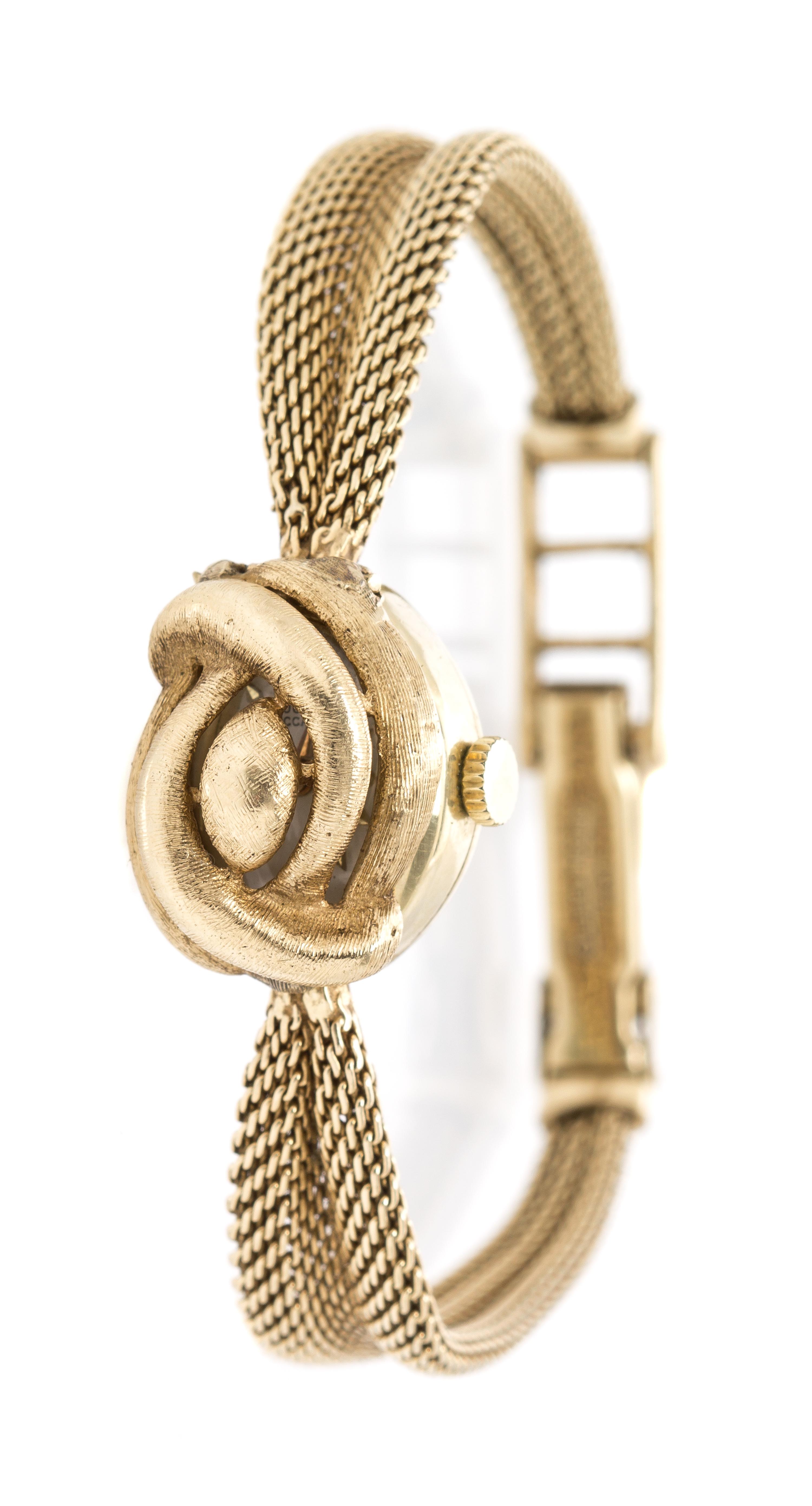 A 14 Karat Yellow Gold Surprise Wristwatch, Lucien Piccard, 14.10 dwts.
