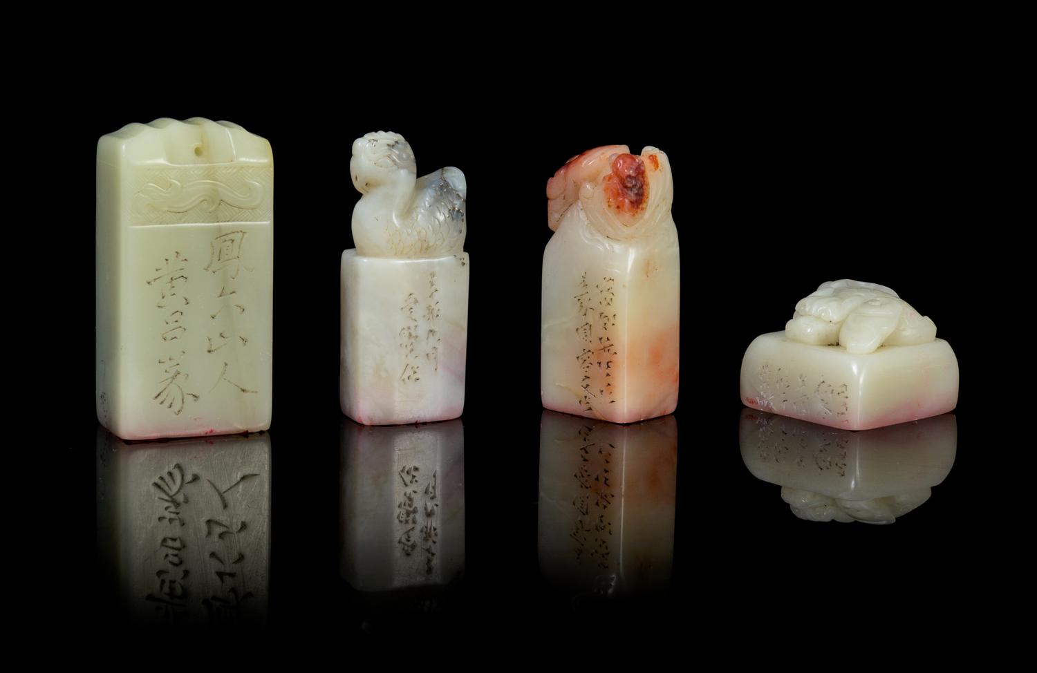 A Group of Four Carved Hardstone Seals Height of tallest 2 1/8 inches.