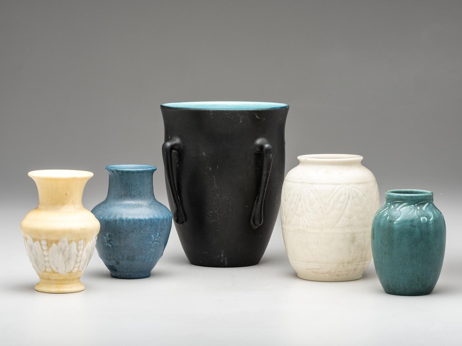 Five Carved and Mat Vases