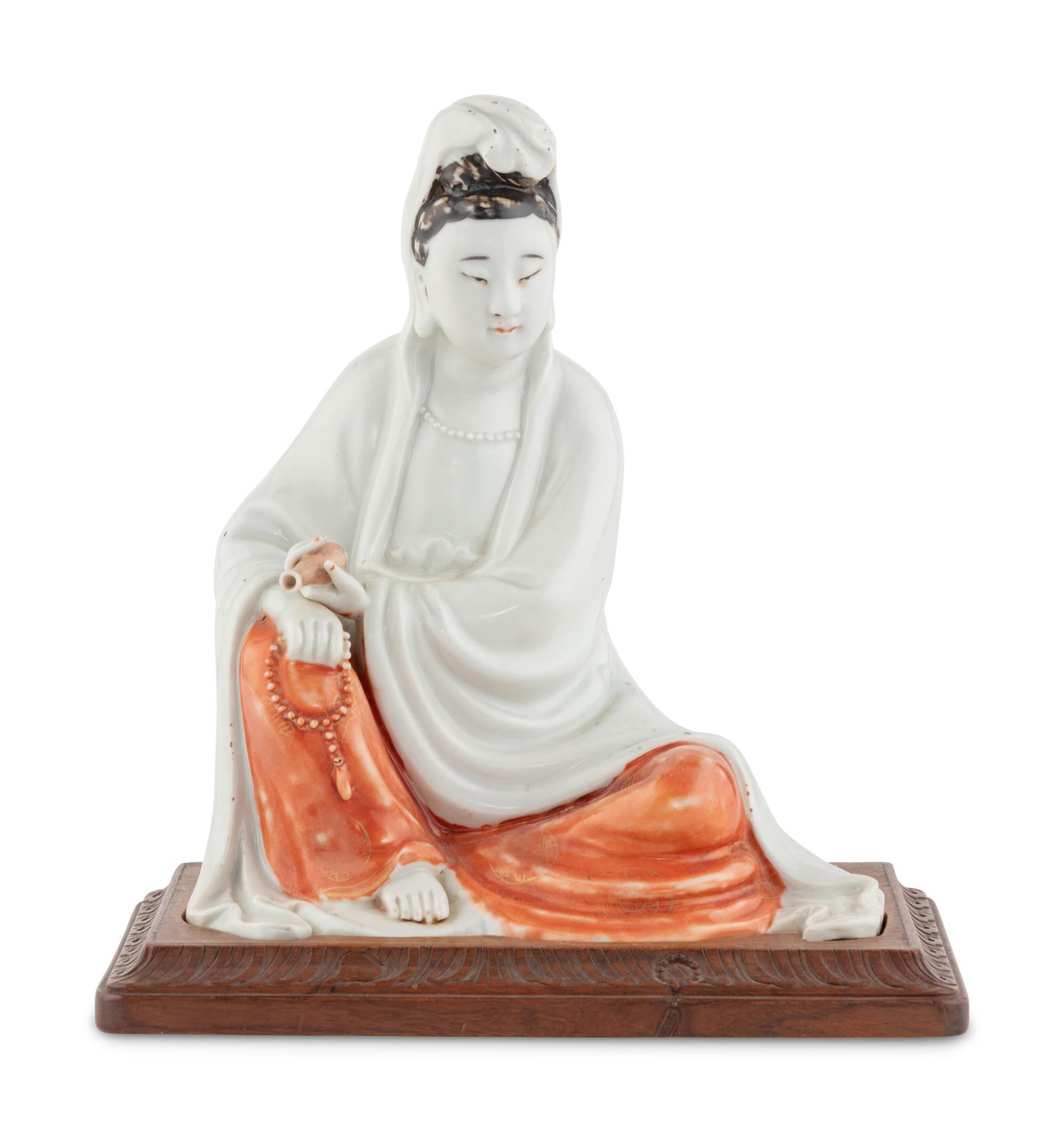 A Chinese Iron Red Decorated Porcelain Figure of Guanyin