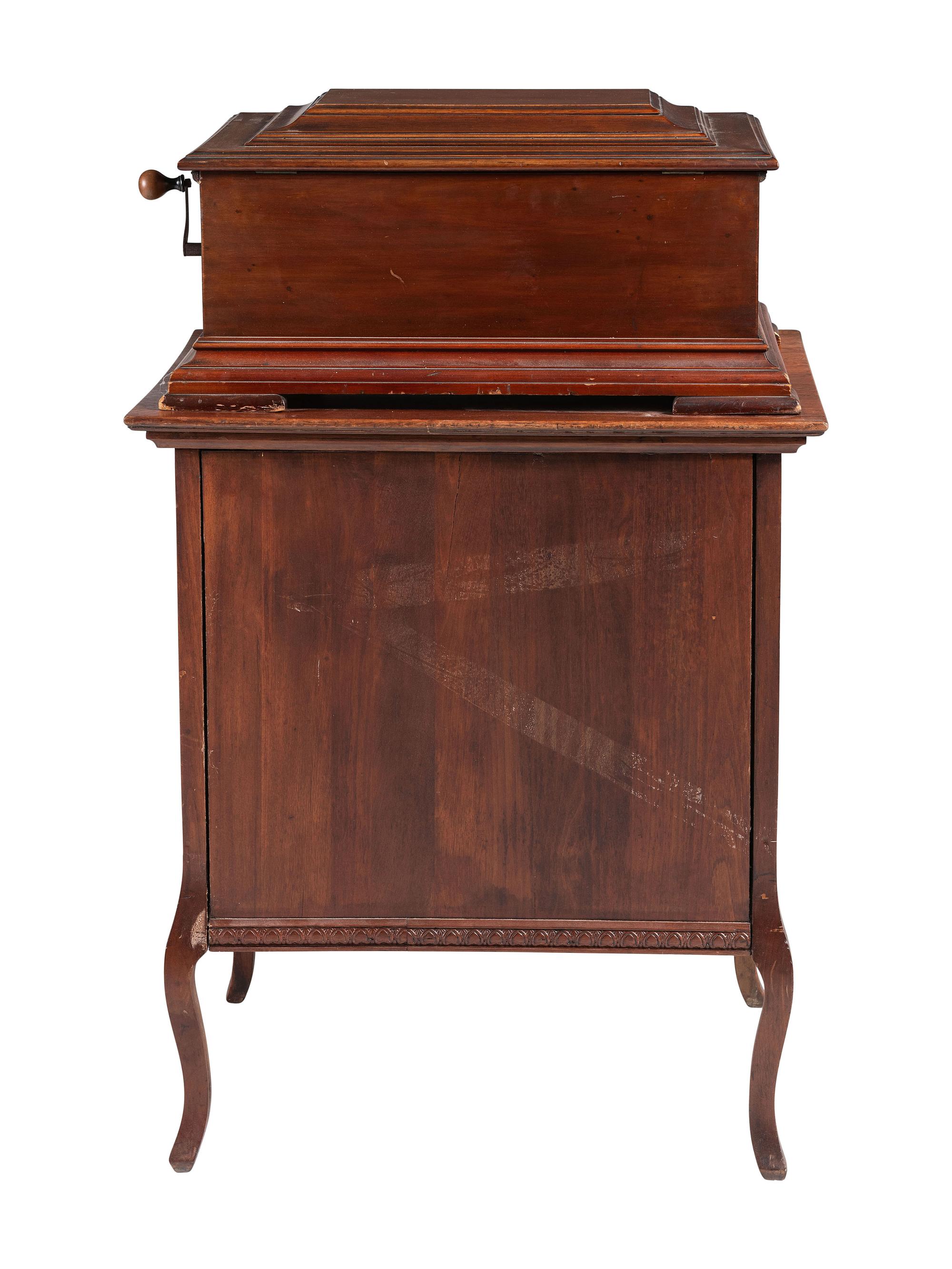 A Mira Mahogany-Cased Disc Music Box and Cabinet