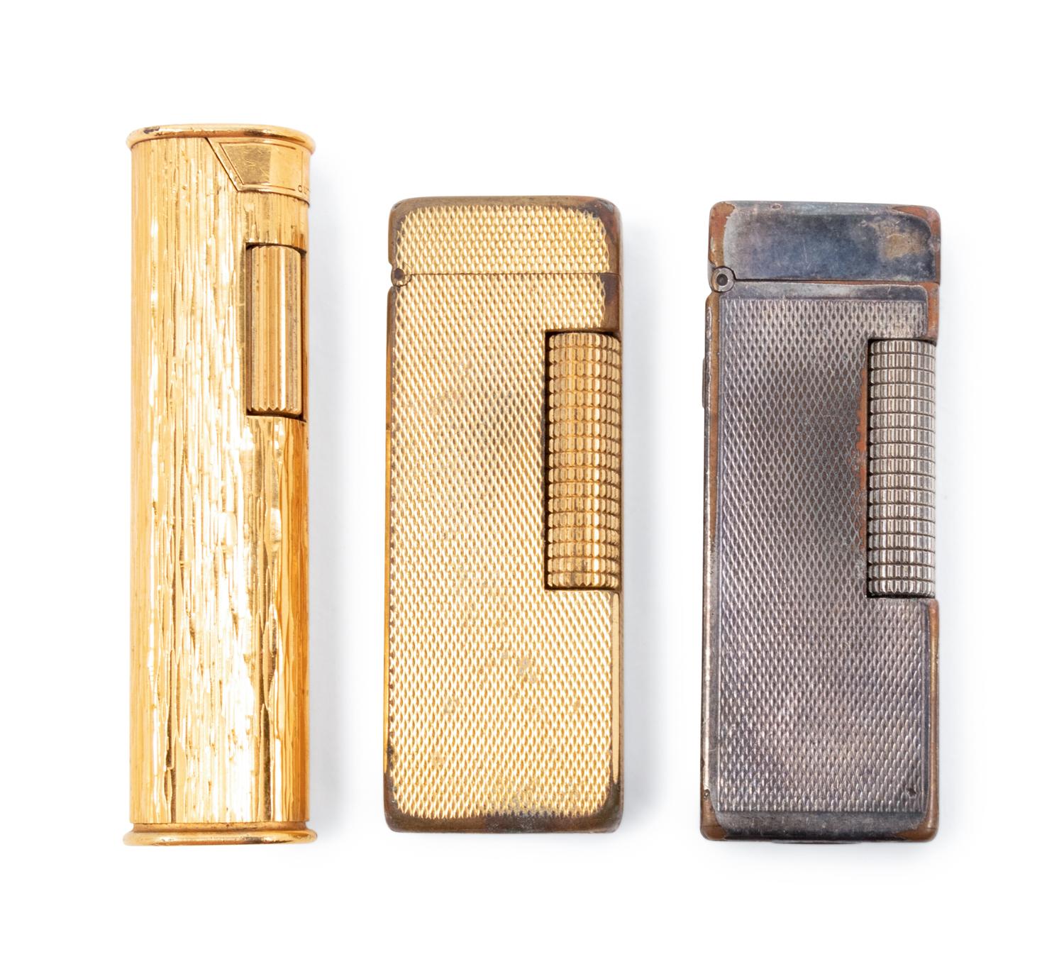 A Group of Three Dunhill Lighters