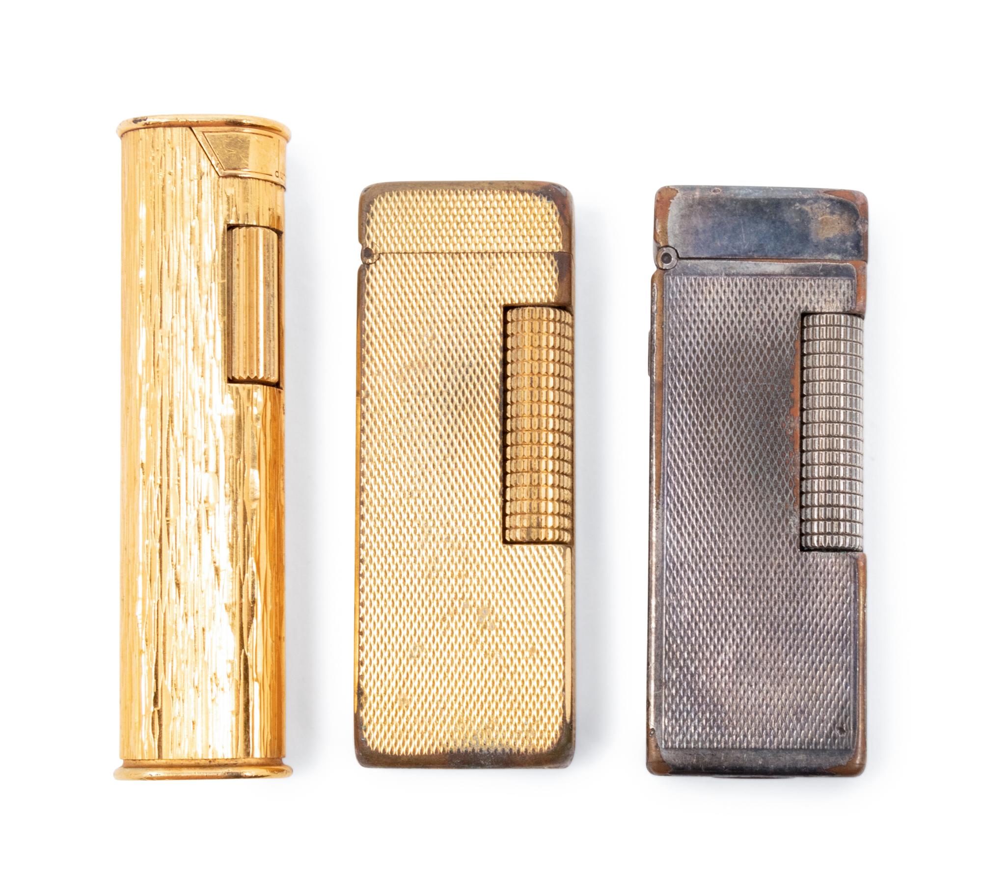 A Group of Three Dunhill Lighters