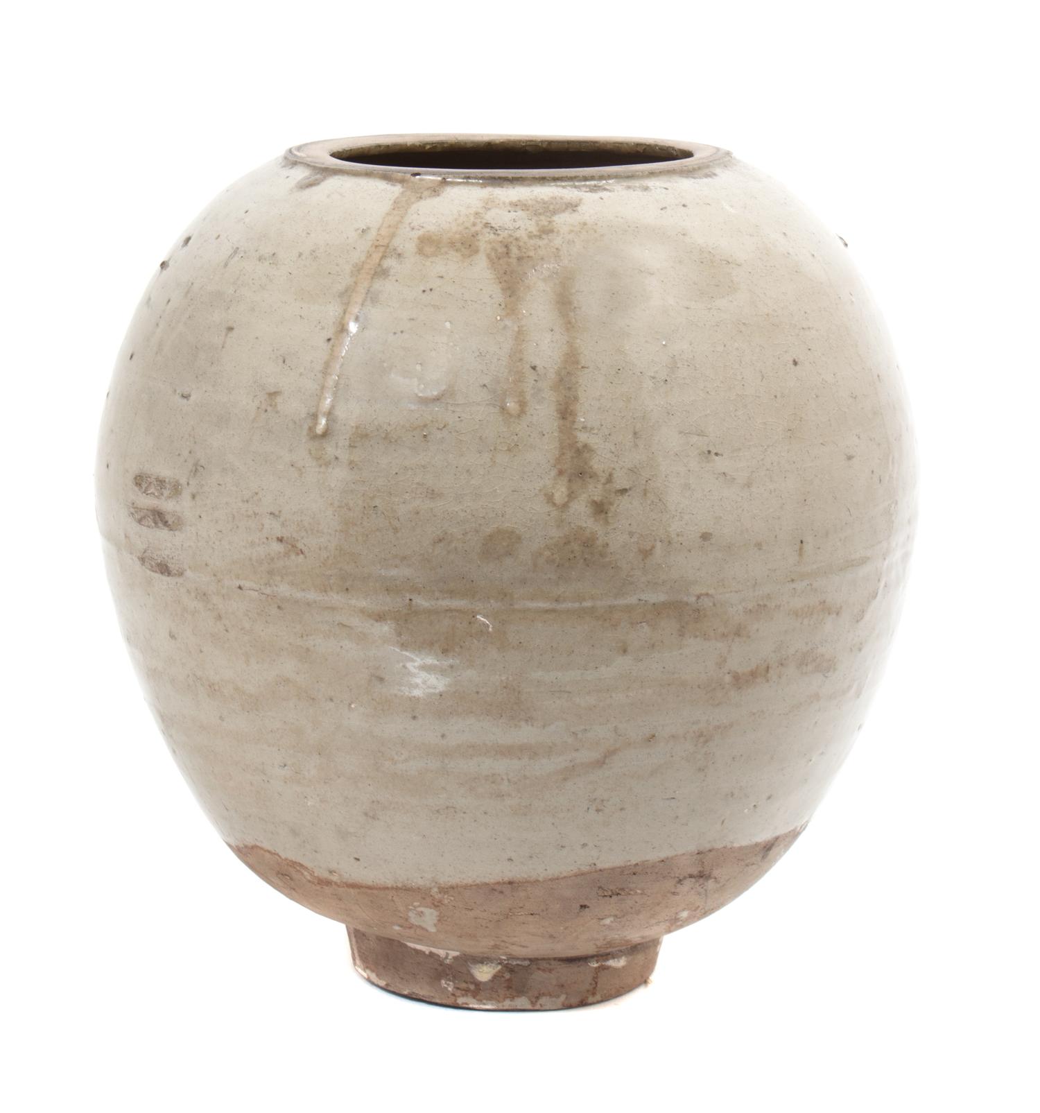 A Celadon Glazed Jar Height 11 inches.