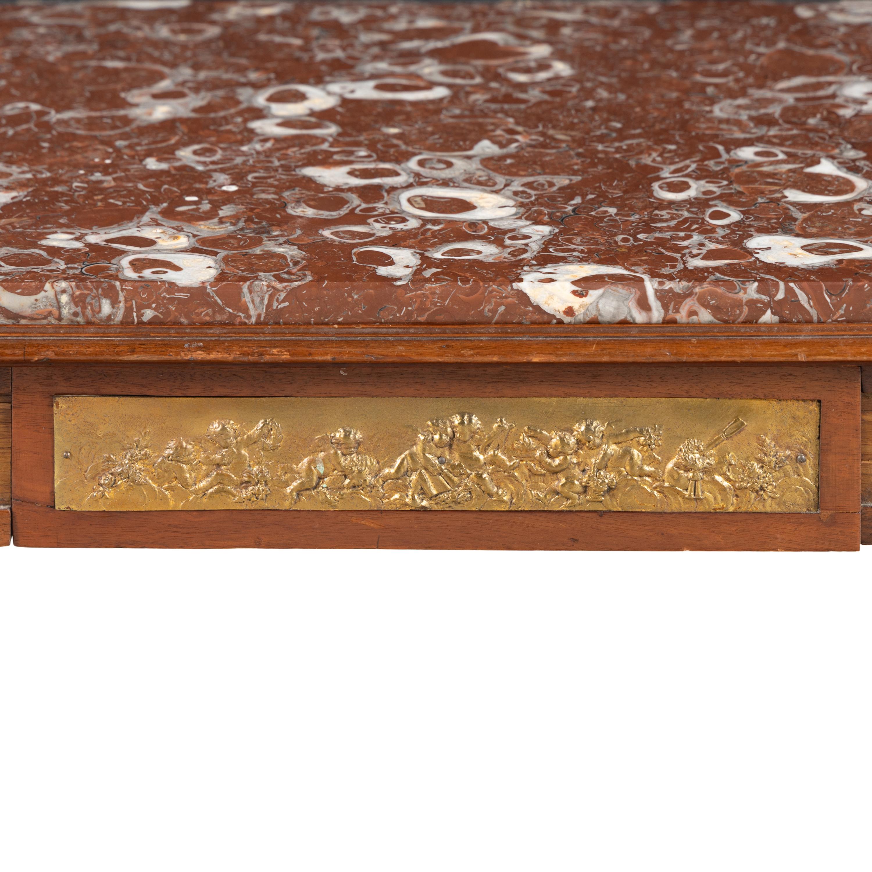 A French Gilt Bronze Mounted Mahogany and Marble-Top Low Table